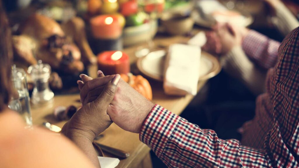 Help out for the Holidays! 15 a close-up of hands holding each other