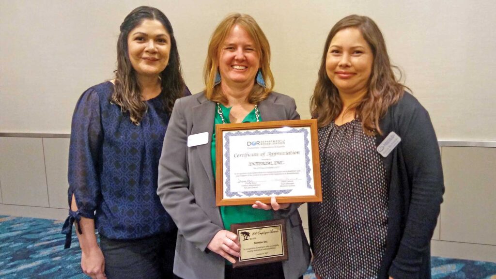 Interim Receives Employer Award from the Monterey County Committee for the Employment of People with Disabilities 11 a group of women holding a certificate