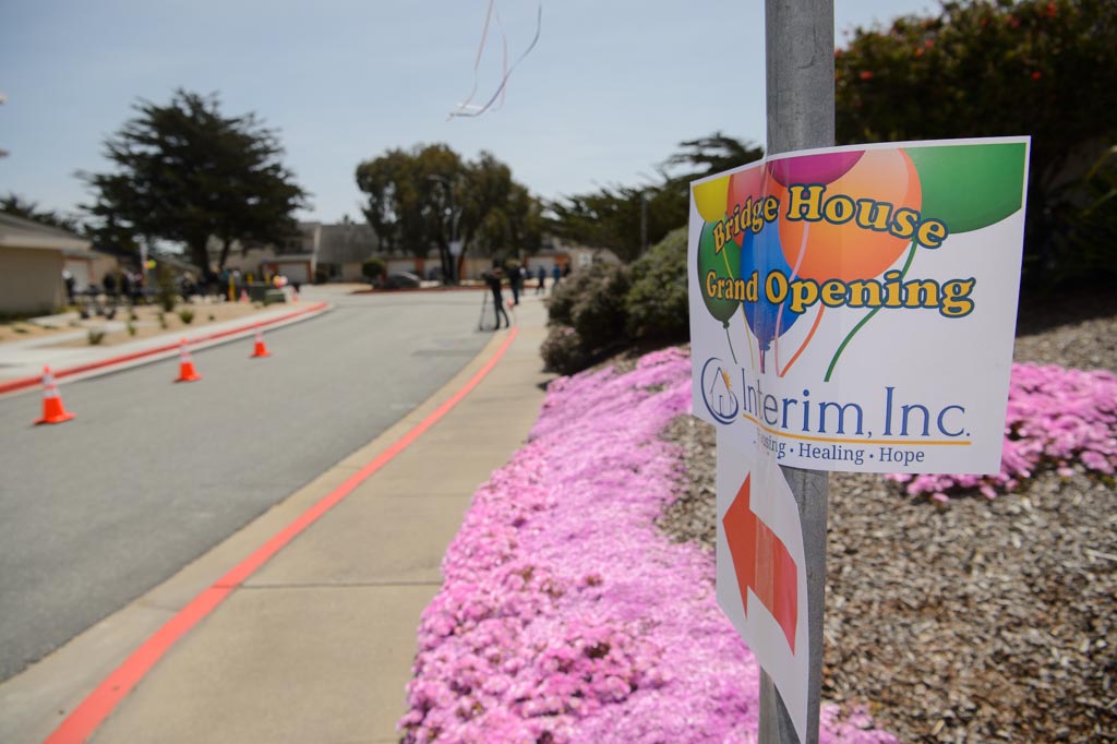 KSBW News Coverage: New Bridge House Grand Opening 5 a sign on a pole