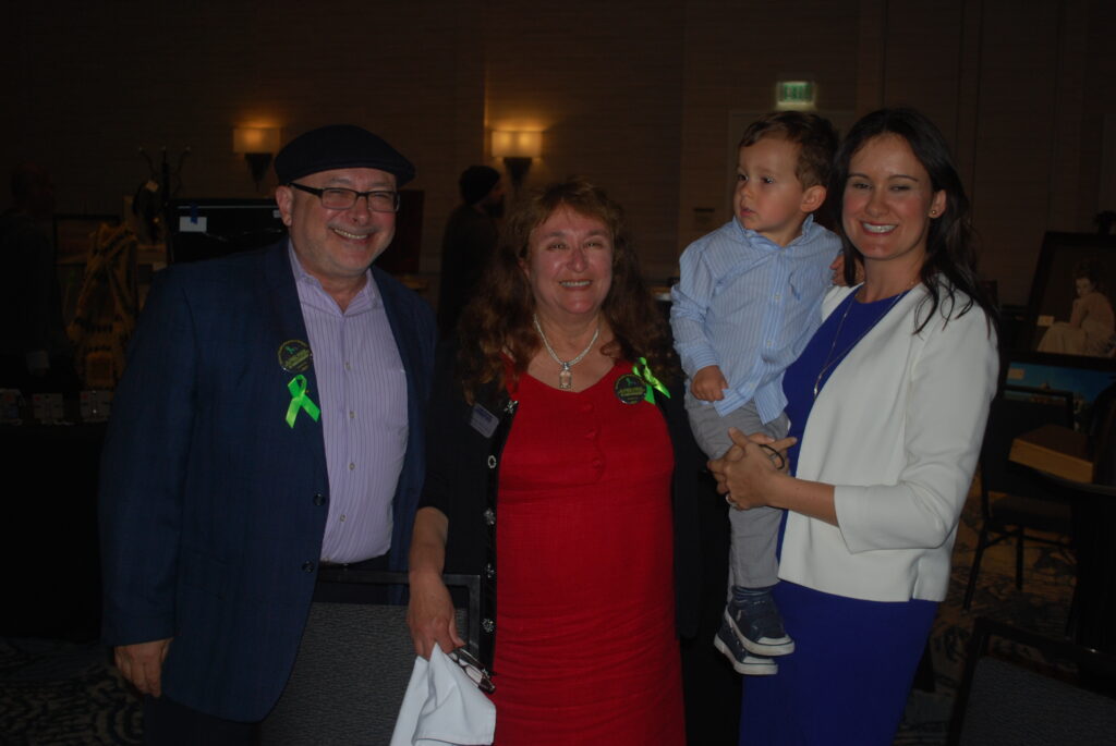 Annual Mental Health Awareness Banquet Honors Interim Volunteers on May 4th! 4 a group of people posing for a photo