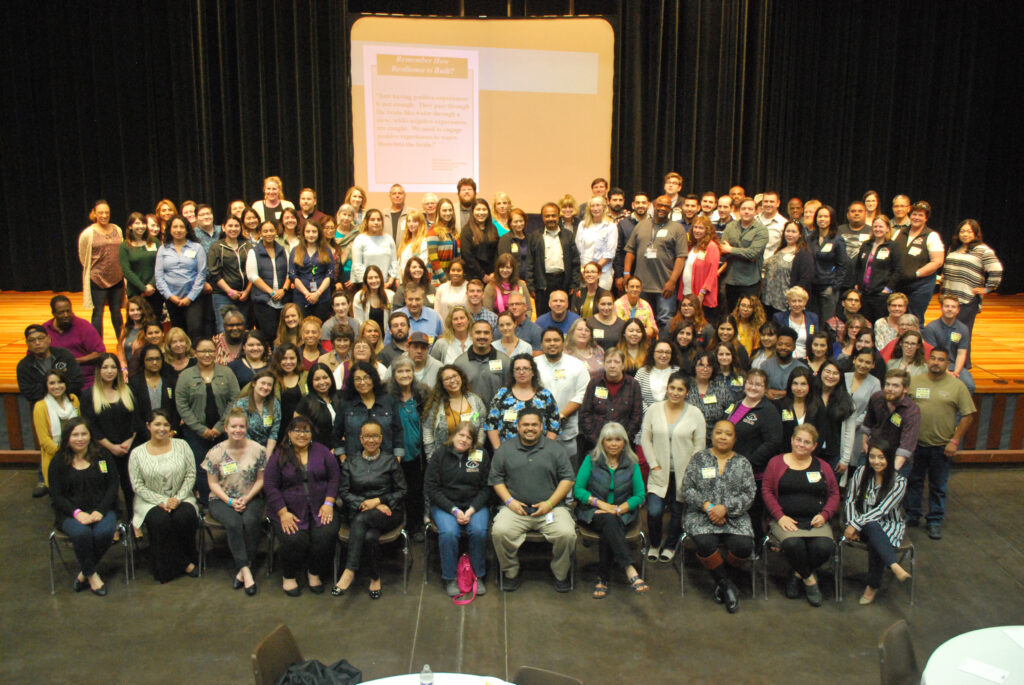 Interim Staff Come Together for Annual Training Day on June 5th 2 a group of people posing for a photo