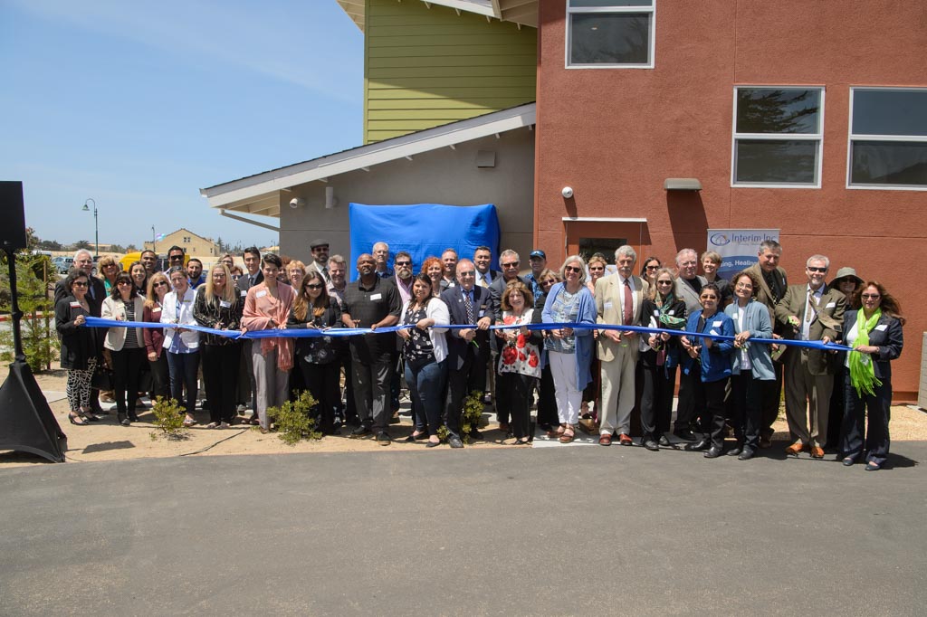 Interim Opens Second Crisis Residential Facility, Manzanita Monterey 1 a group of people holding a blue ribbon