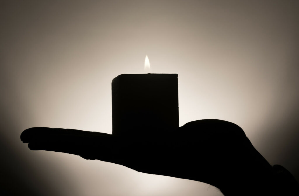 Mental Illness: A Mother's Story 3 a hand holding a candle
