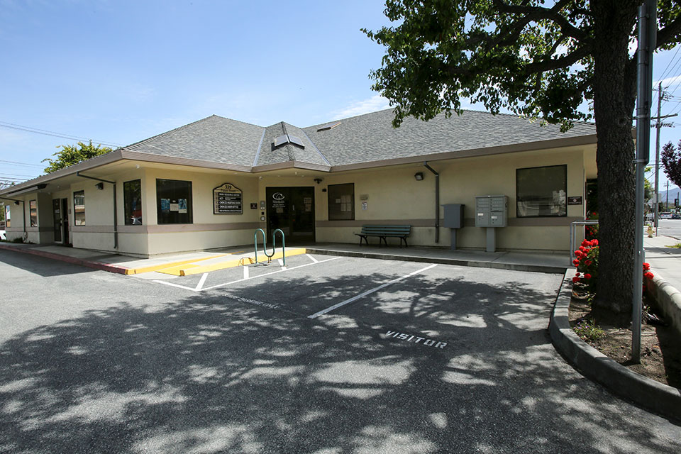 a building with a parking lot