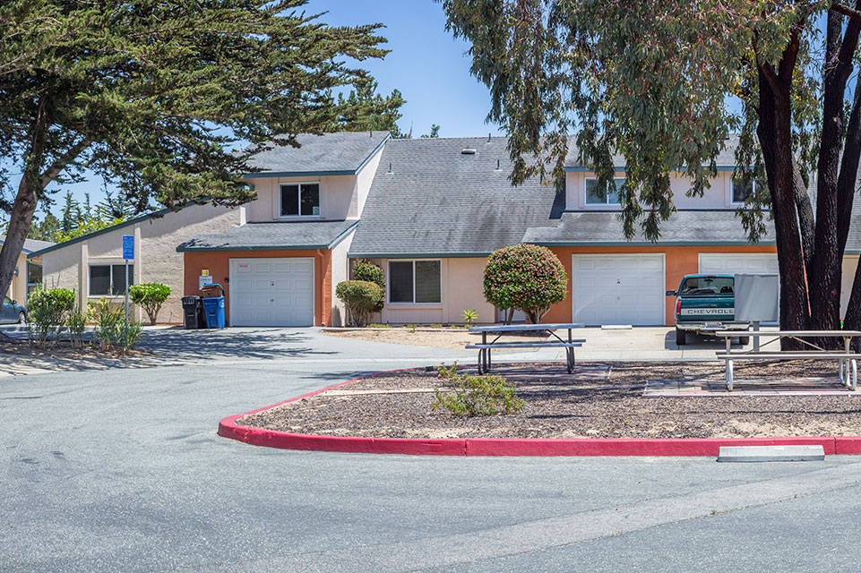 a house with a picnic table and picnic table