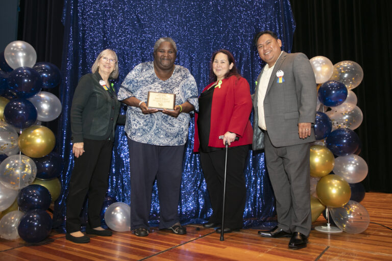 Kontrena M. Receives Service Award