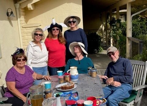 a group of people sitting at a table