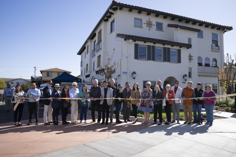 a group of people holding a rope