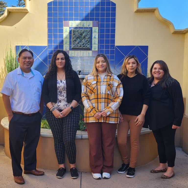 a group of people posing for a photo
