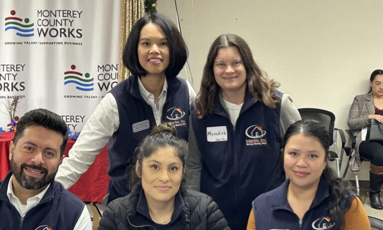 a group of women posing for a photo