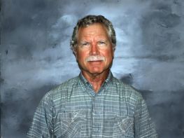 a man with a mustache and beard