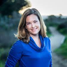 a woman in a blue shirt