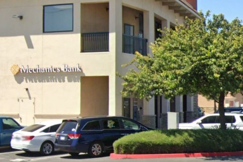 a building with cars parked in front of it