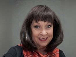 a woman with short brown hair