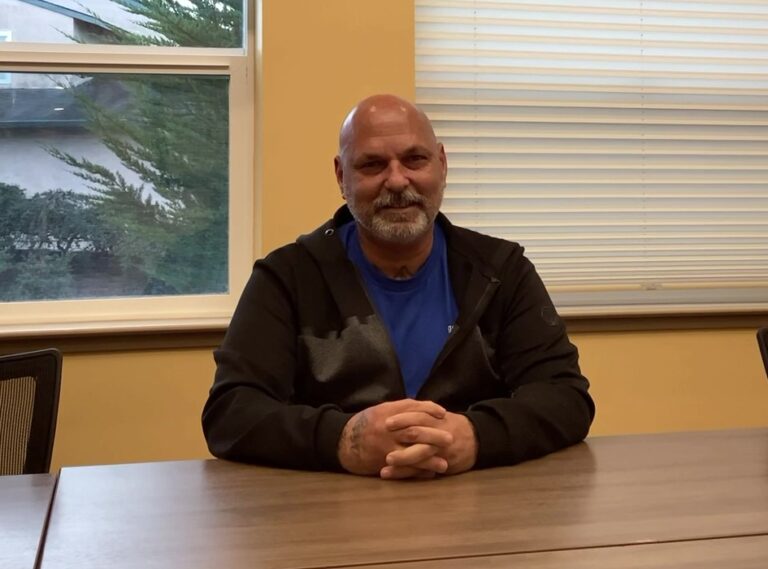 a man sitting at a table