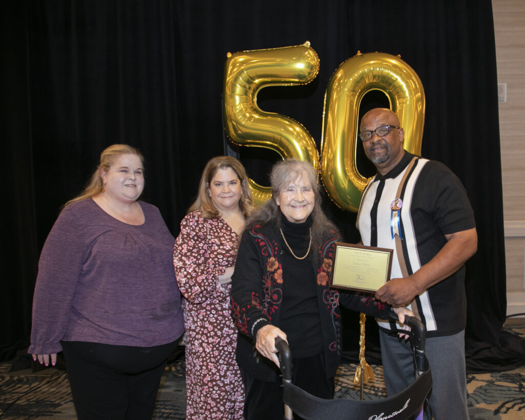 a group of people posing for a photo