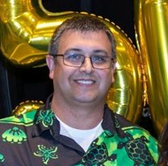 a man in a green shirt