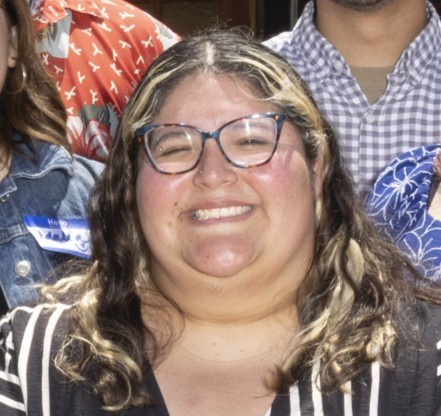 a woman smiling at camera